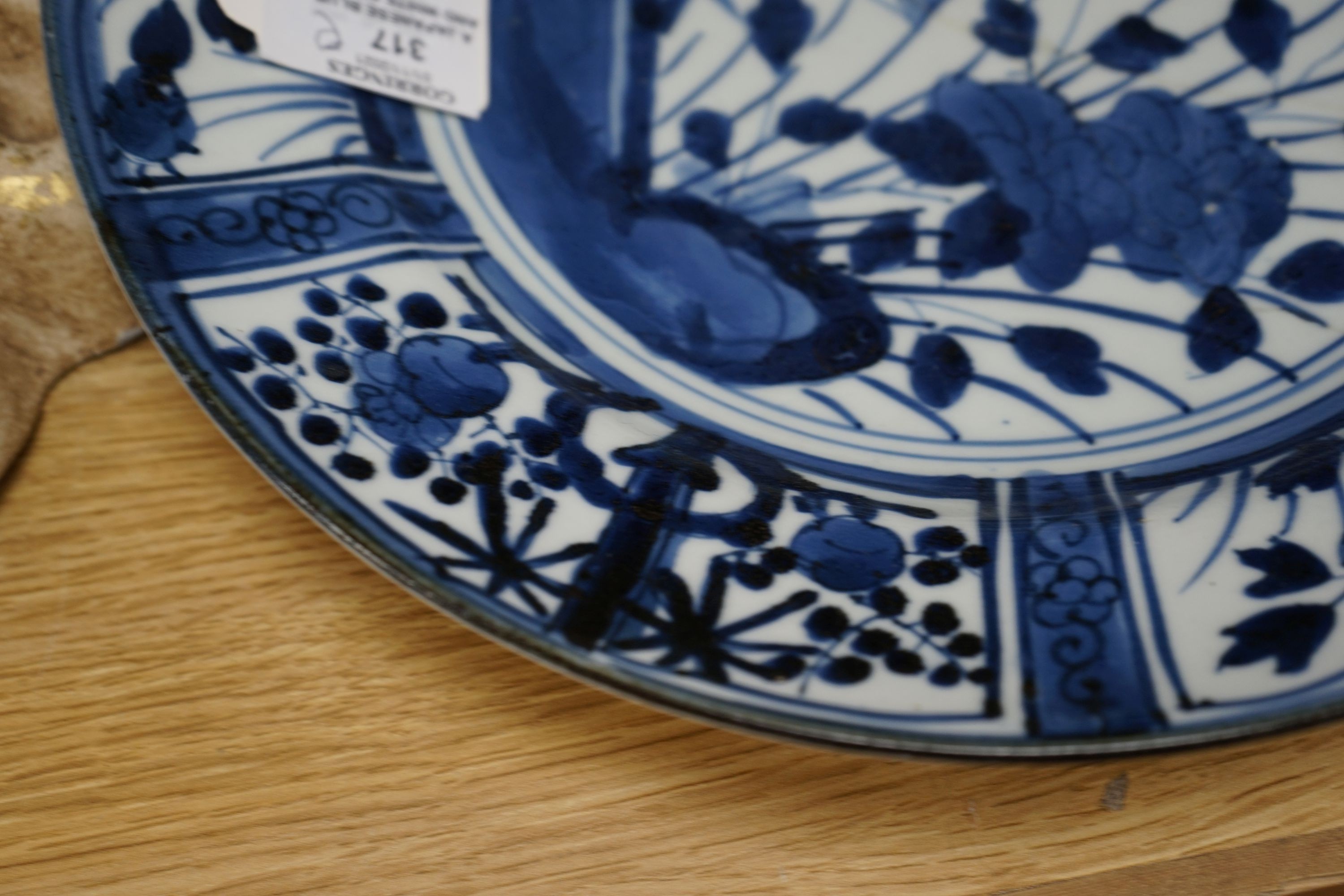 A Japanese blue and white dish, a Chinese blue and white meiping and a clobbered plate 33cm